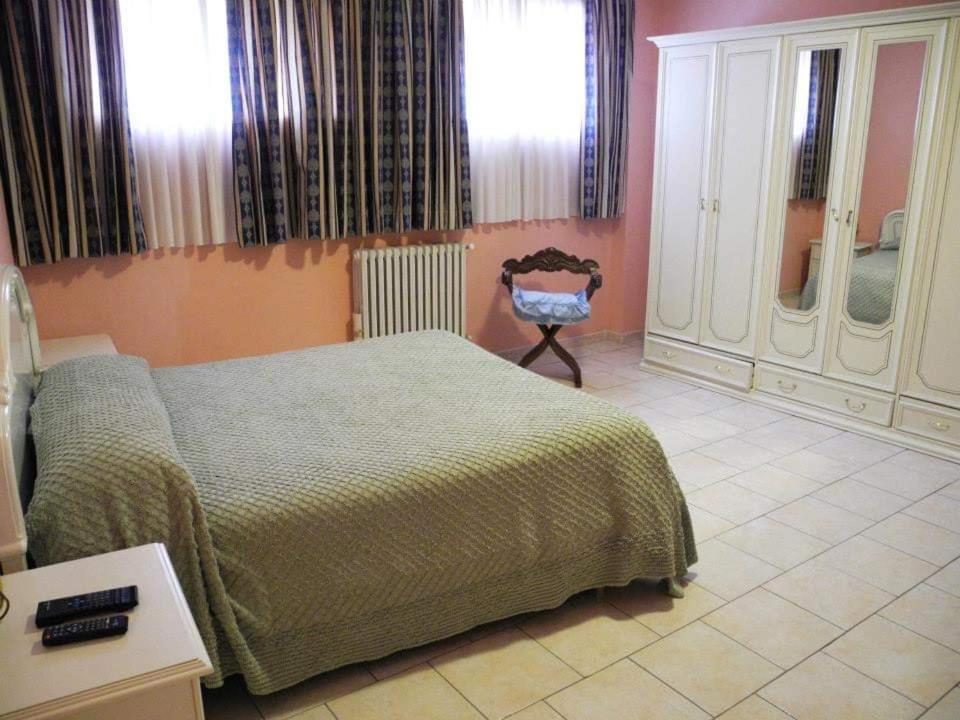 A bed or beds in a room at Affittacamere simona