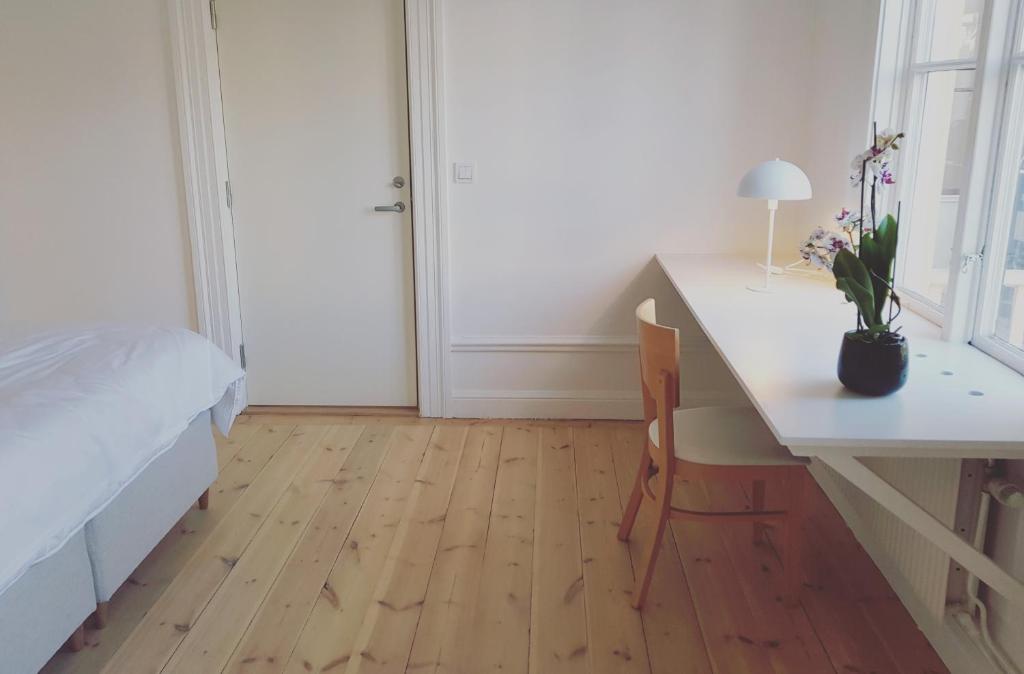 Postel nebo postele na pokoji v ubytování Prästgården Hotell & Bryggeri