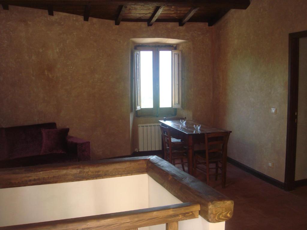 Postel nebo postele na pokoji v ubytování IL BORGO DI SAN PIO