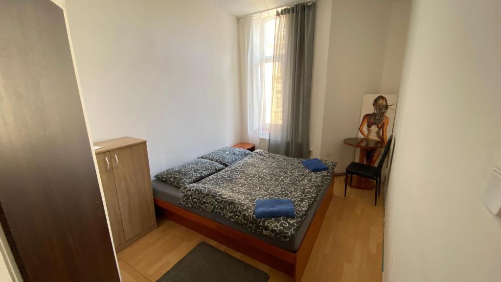 Postel nebo postele na pokoji v ubytování U Betty - Ostrava Centrum