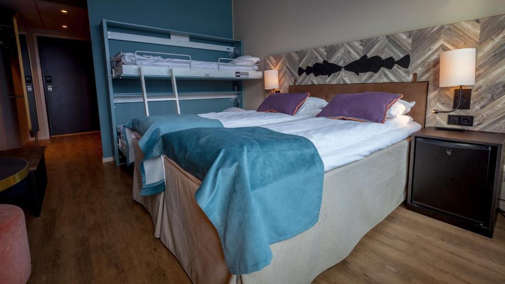 Postel nebo postele na pokoji v ubytování Scandic Grand Tromsø