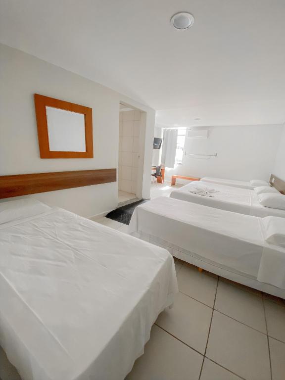 Postel nebo postele na pokoji v ubytování Principe Hotel