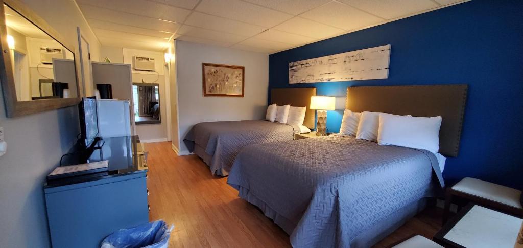 Postel nebo postele na pokoji v ubytování Lido Motel Lake George