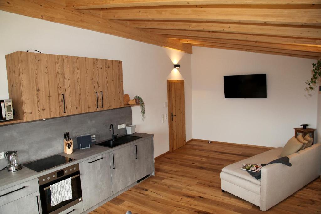 Kuchyň nebo kuchyňský kout v ubytování Apart Grubertal