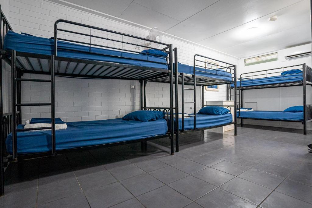 Postel nebo postele na pokoji v ubytování Nomads Noosa