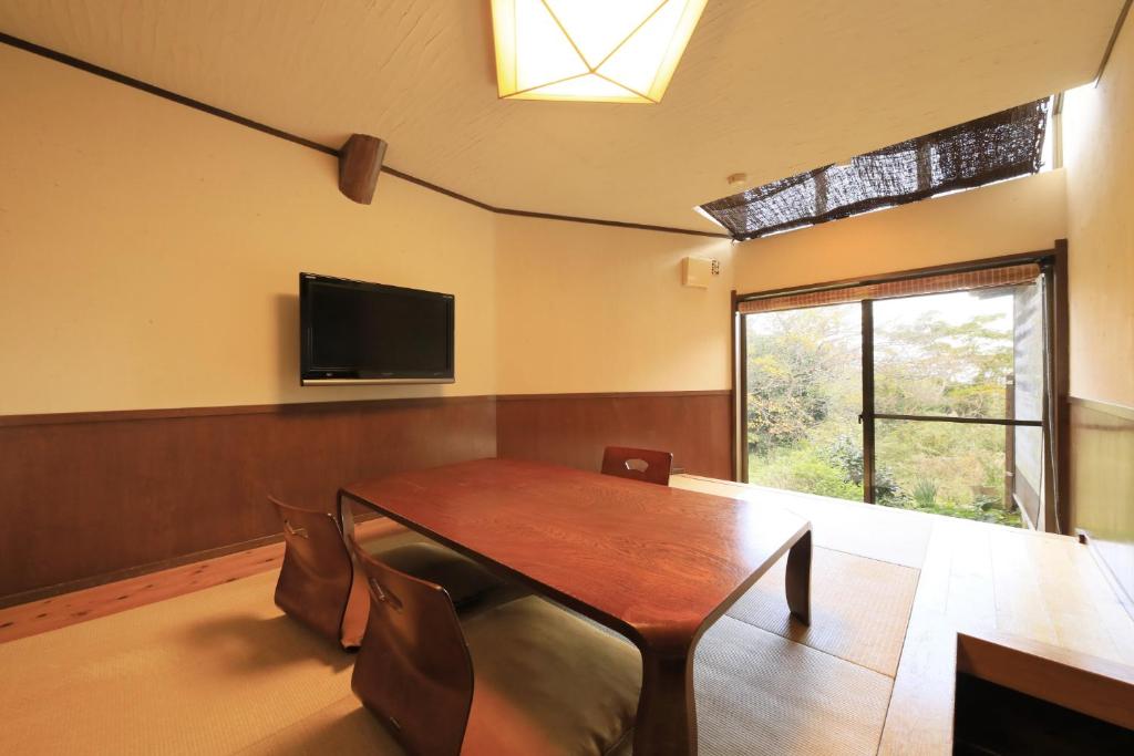Welcome Inn SunnyStepsにあるテレビまたはエンターテインメントセンター