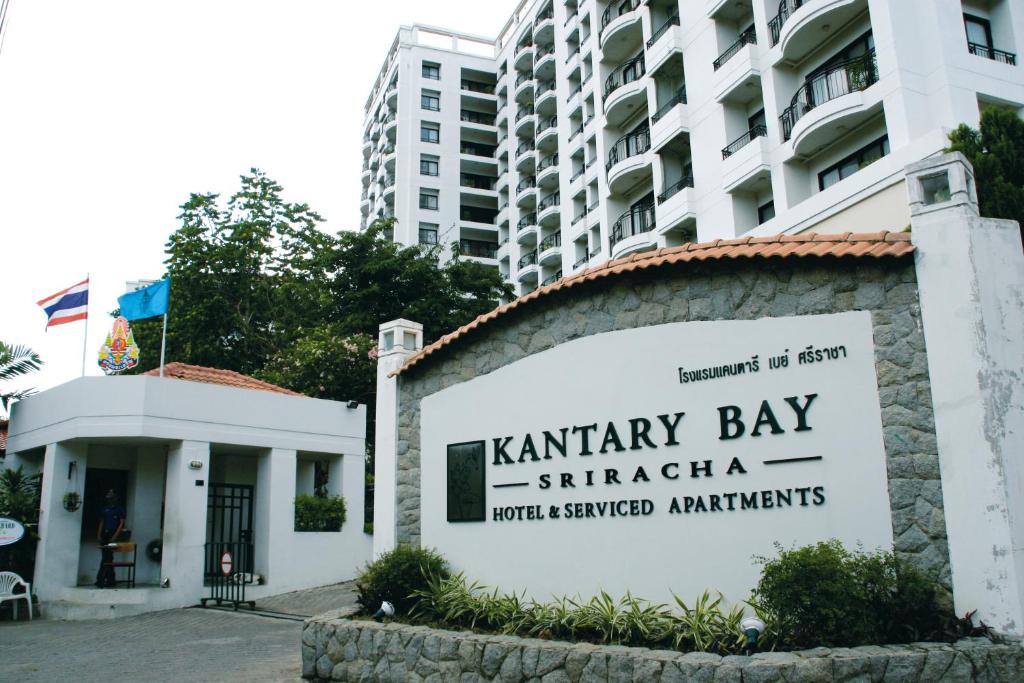 a sign for the kaminari bay sharjah hotel serviced apartments at Kantary Bay Hotel And Serviced Apartments Sriracha in Si Racha