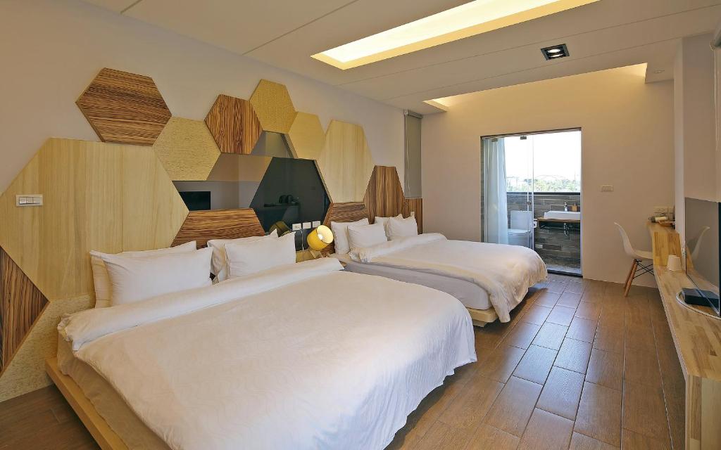 Ένα ή περισσότερα κρεβάτια σε δωμάτιο στο Sunny Stream B & B