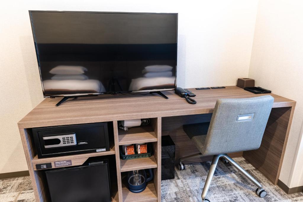 TV a/nebo společenská místnost v ubytování Hotel Kazusaya