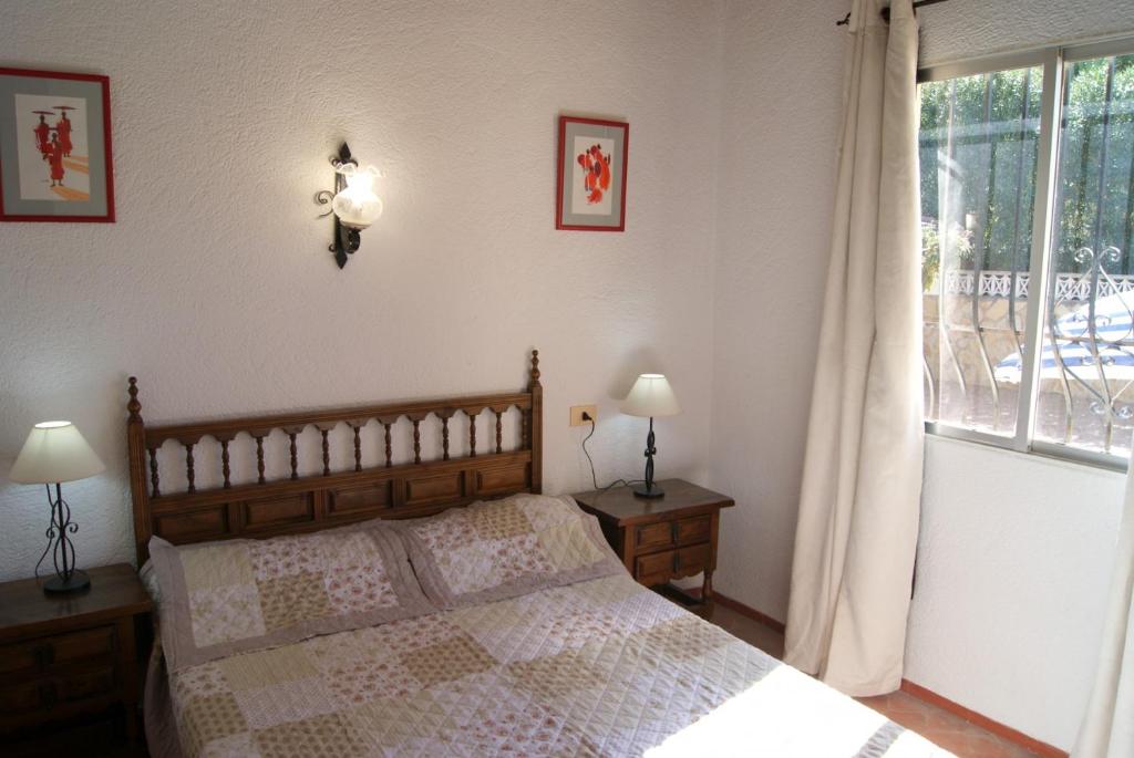A bed or beds in a room at Villa Efaistos
