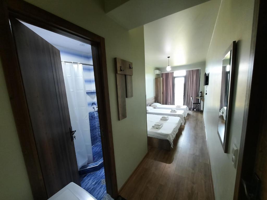 Postel nebo postele na pokoji v ubytování Delta Hotel