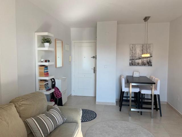 A seating area at Apartamento Marina Port sea view