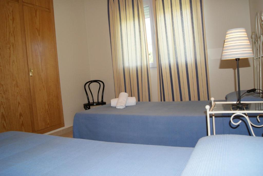 Postel nebo postele na pokoji v ubytování 0533 Villa Laura