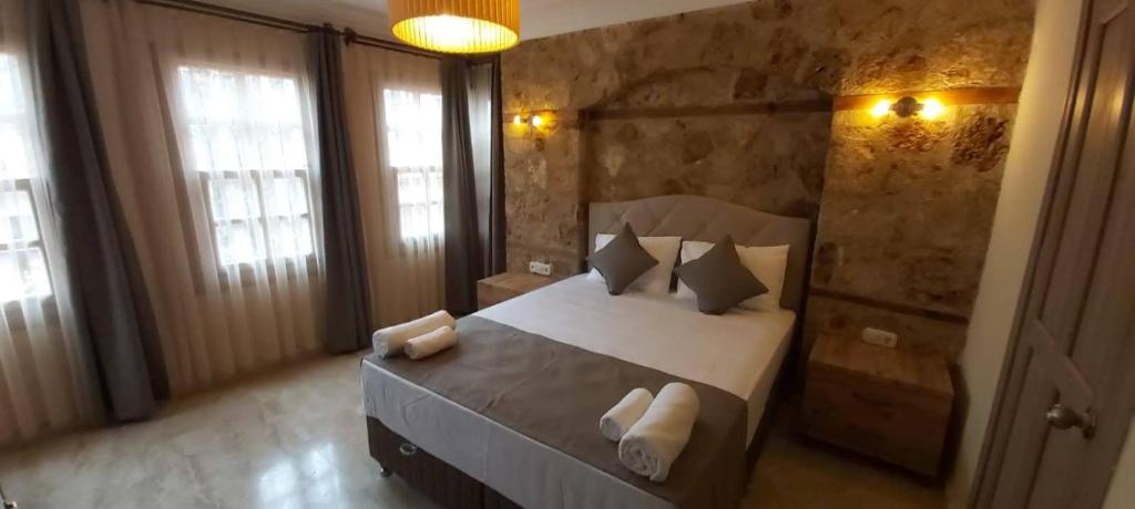 Postel nebo postele na pokoji v ubytování VILLA CASTLE INN