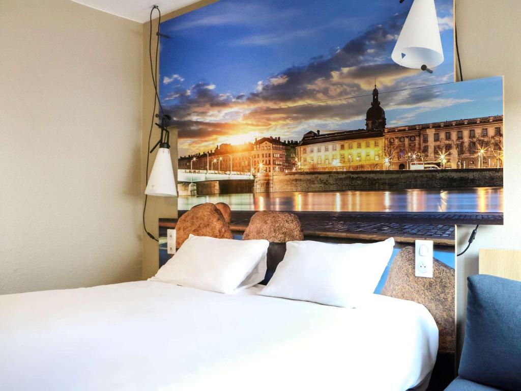 Postel nebo postele na pokoji v ubytování ibis Lyon Gerland Merieux