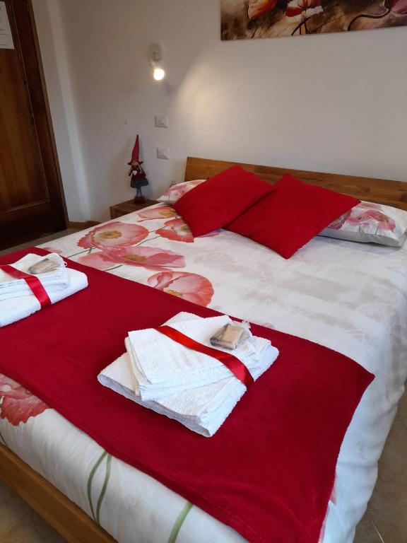 Postel nebo postele na pokoji v ubytování B&B La casa di Loretta
