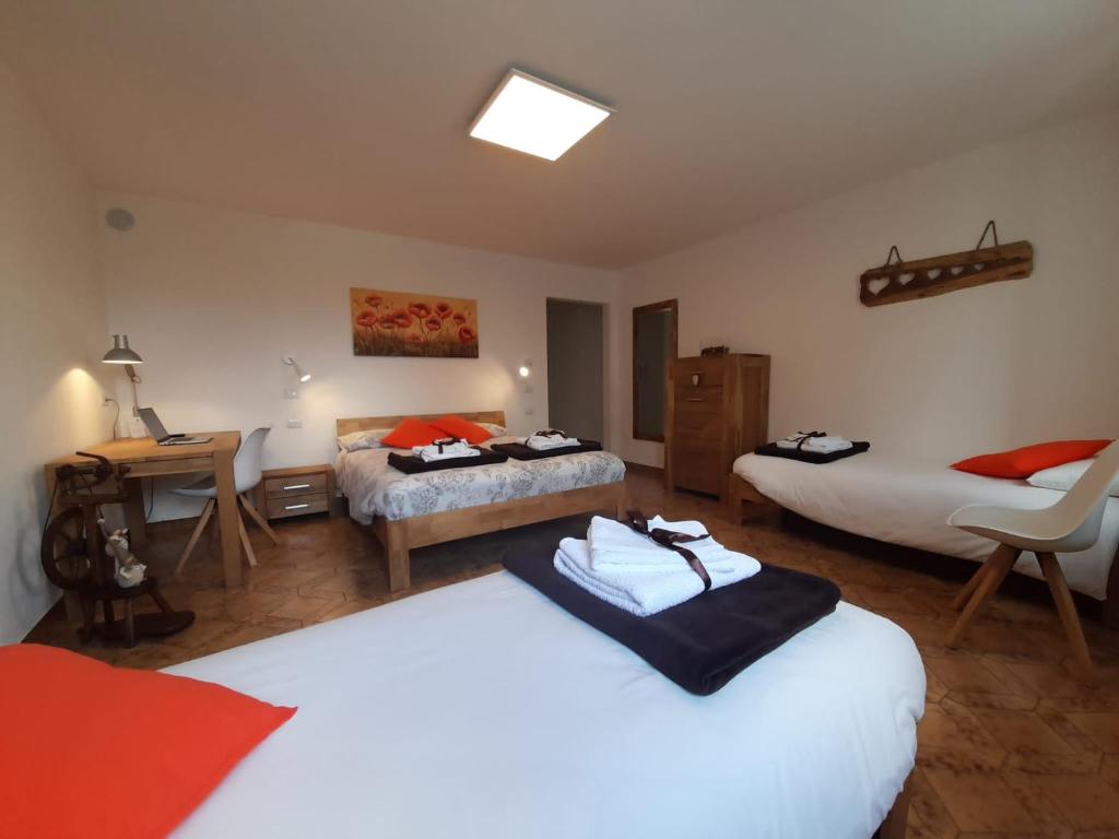 Postel nebo postele na pokoji v ubytování B&B La casa di Loretta