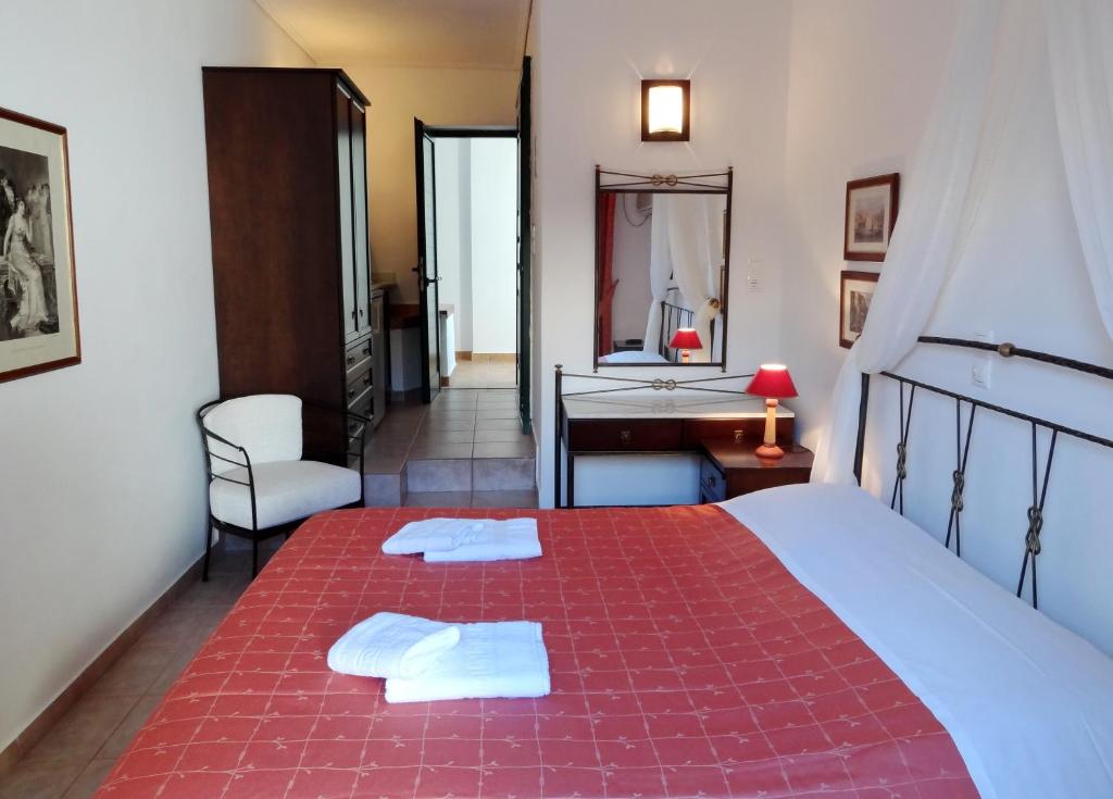 Voodi või voodid majutusasutuse Dionysos Hotel toas