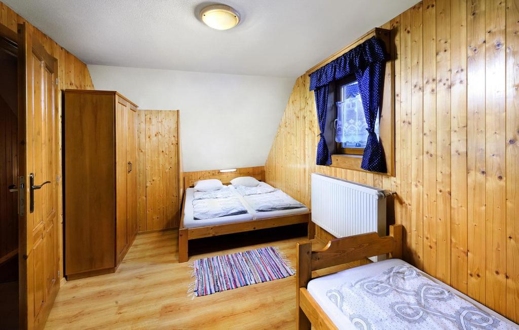 Postel nebo postele na pokoji v ubytování Chalupa Goral