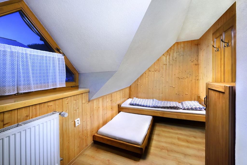 Postel nebo postele na pokoji v ubytování Chalupa Goral