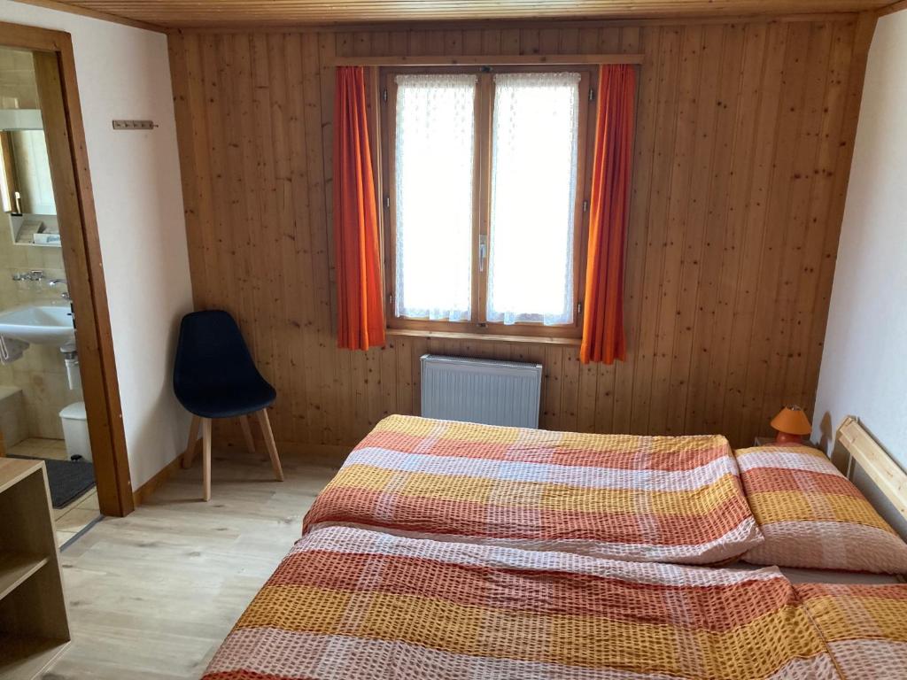 Postel nebo postele na pokoji v ubytování Hôtel du Gd-St-Bernard