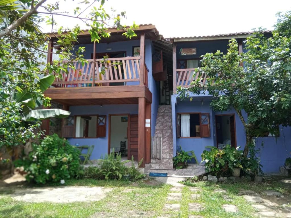 a view of a house with a balcony at Pousada Recanto dos Pássaros in Trindade