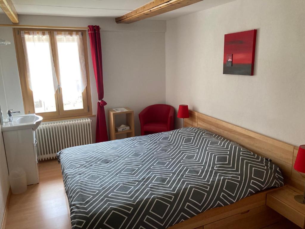 Postel nebo postele na pokoji v ubytování Hôtel du Gd-St-Bernard