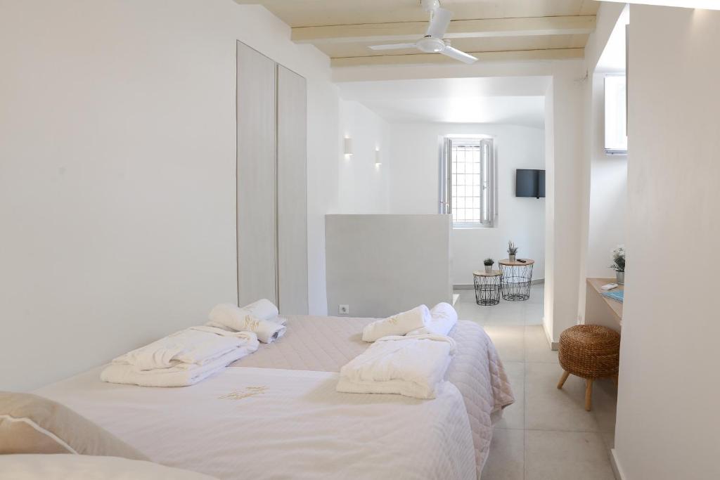 Postel nebo postele na pokoji v ubytování La Maison de Marie Geraldine
