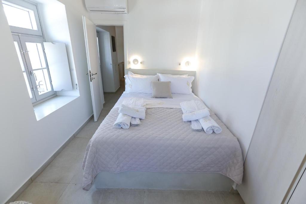 Postel nebo postele na pokoji v ubytování La Maison de Marie Geraldine