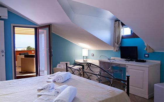 Postel nebo postele na pokoji v ubytování B&B 7Cento Ulivi