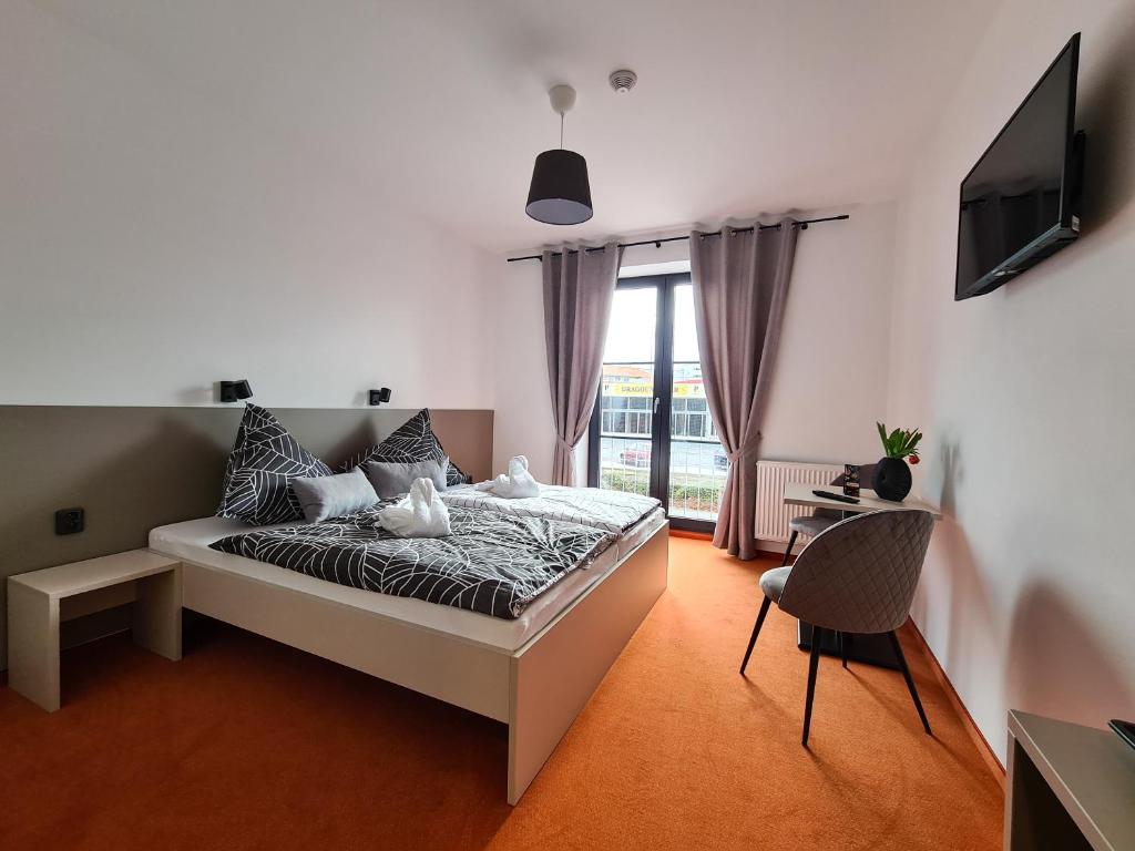 Letto o letti in una camera di Pension Berlin