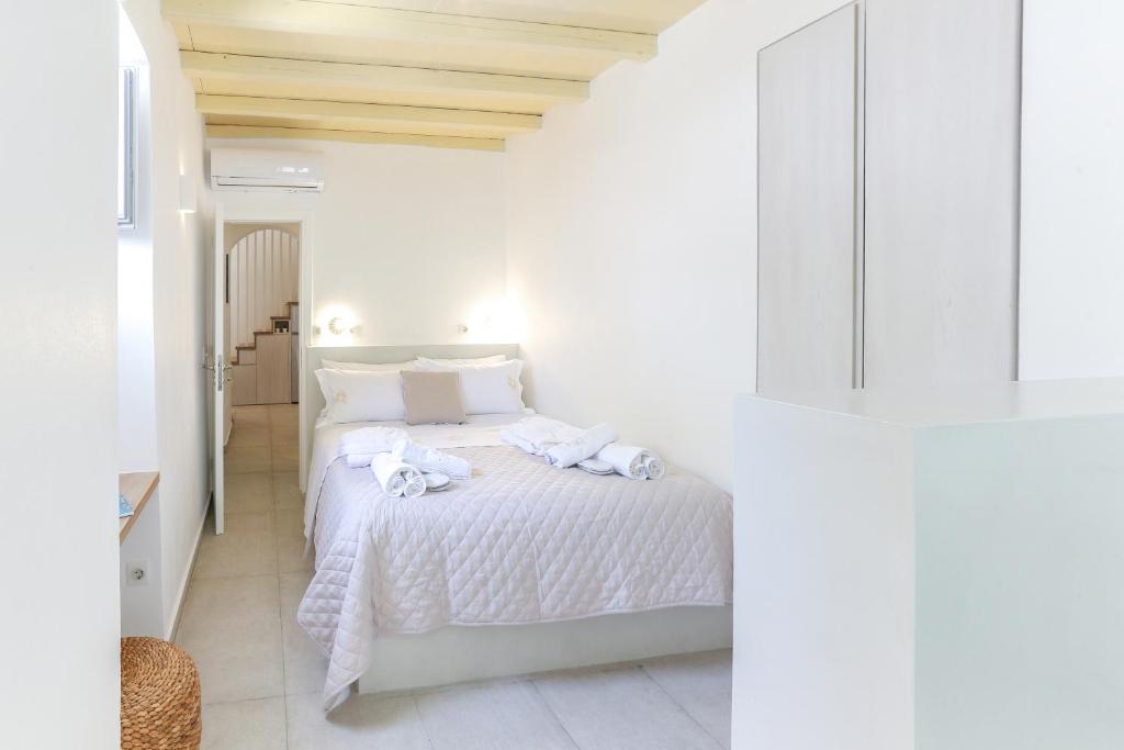 Postel nebo postele na pokoji v ubytování La Maison de Marie Geraldine