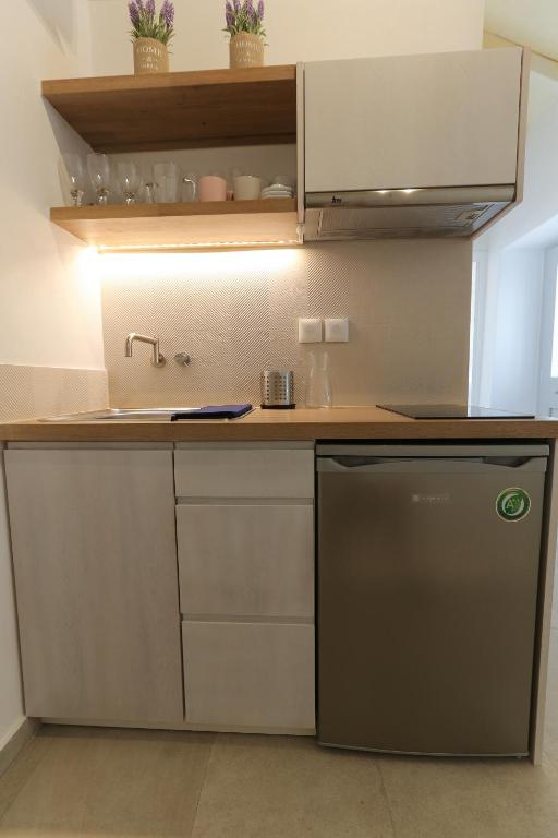 Kuchyň nebo kuchyňský kout v ubytování La Maison de Marie Geraldine
