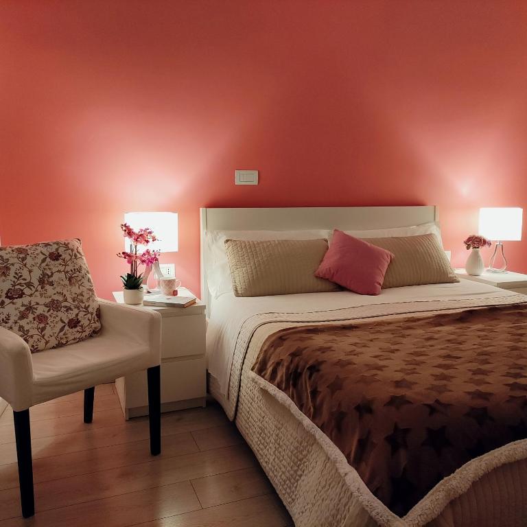 Postel nebo postele na pokoji v ubytování Dimora Francesca