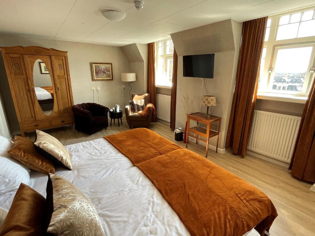 Ліжко або ліжка в номері Hotel restaurant Stad Munster
