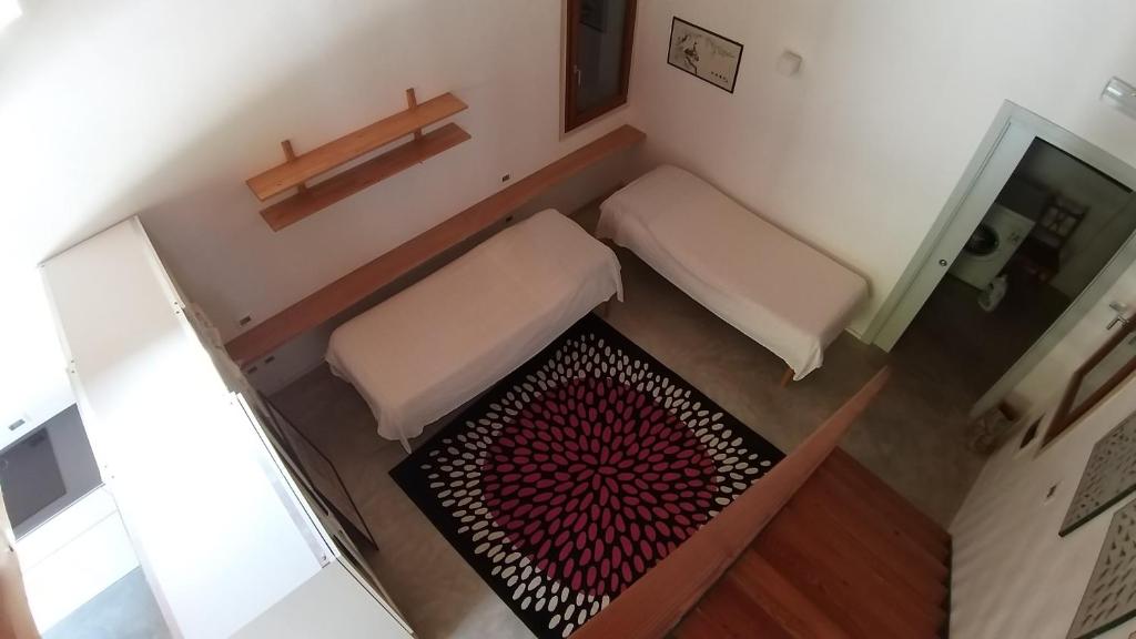 Łóżko lub łóżka w pokoju w obiekcie Agriturismo Corte del Maso