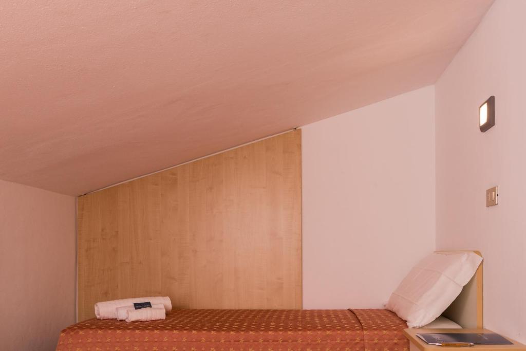 Postel nebo postele na pokoji v ubytování Hotel Lydia