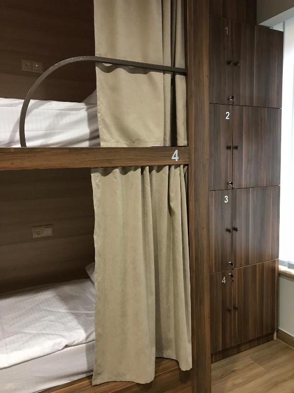 Postel nebo postele na pokoji v ubytování Loft Host Yerevan