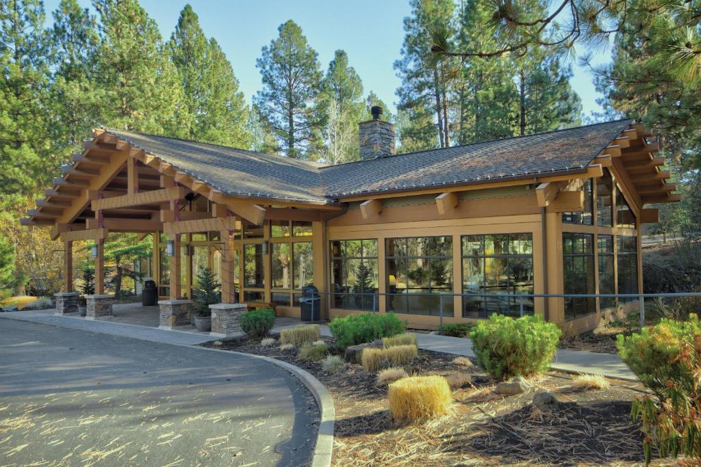 a home with a pavilion in the woods at Seventh Mountain Resort in Bend