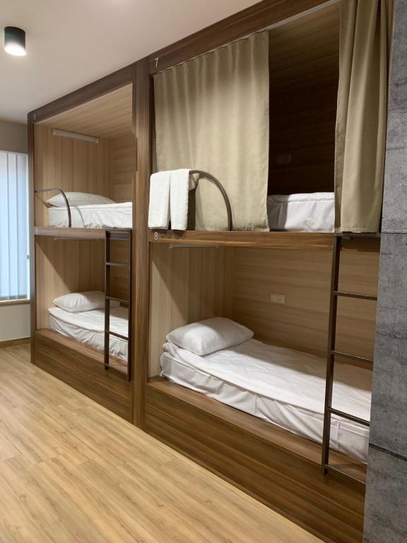 Postel nebo postele na pokoji v ubytování Loft Host Yerevan