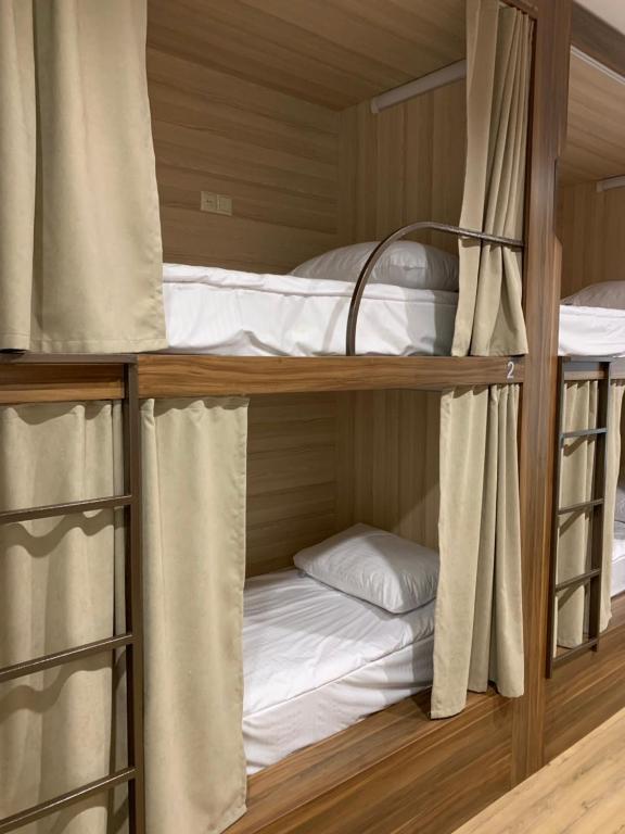 Postel nebo postele na pokoji v ubytování Loft Host Yerevan