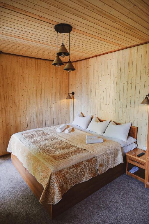 Postel nebo postele na pokoji v ubytování MagHay B&B Hotel in Vanadzor