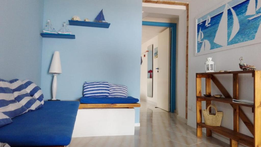 Postel nebo postele na pokoji v ubytování san lorenzo a 4 mt dal mare colore smeraldo a due passi da Marzamemi