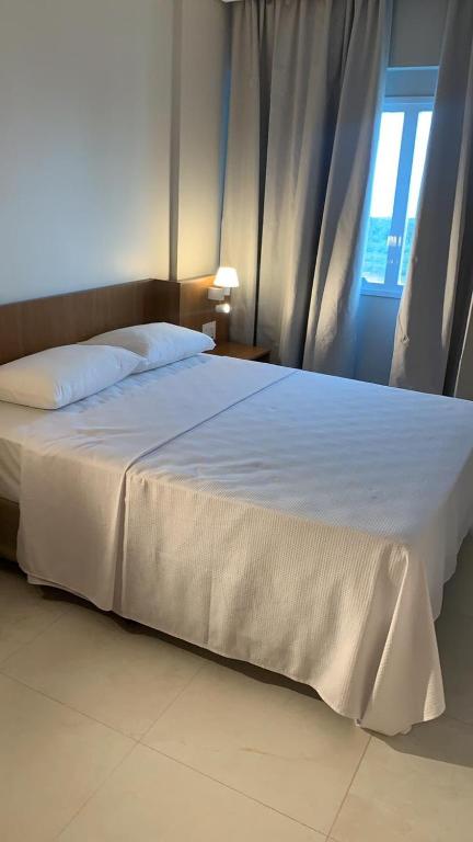 Postel nebo postele na pokoji v ubytování SALINAS EXCLUSIVE RESORT