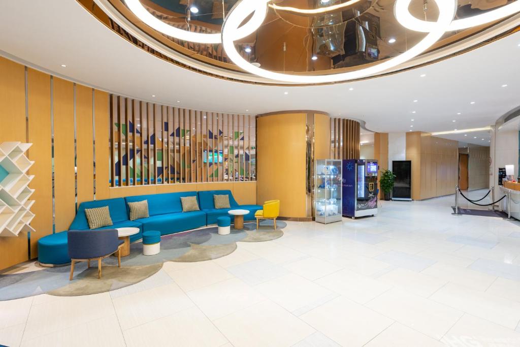 Posezení v ubytování Holiday Inn Express Shanghai Zhenping by IHG