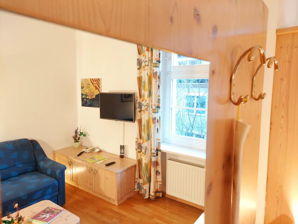 TV a/nebo společenská místnost v ubytování Residence Zum Theater