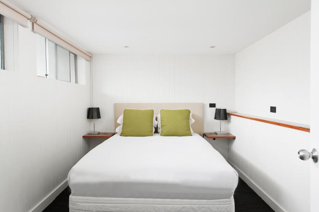 Postel nebo postele na pokoji v ubytování Hotel Nelson