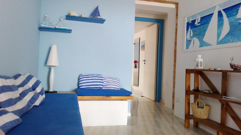 Postel nebo postele na pokoji v ubytování san lorenzo a 4 mt dal mare colore smeraldo a due passi da Marzamemi