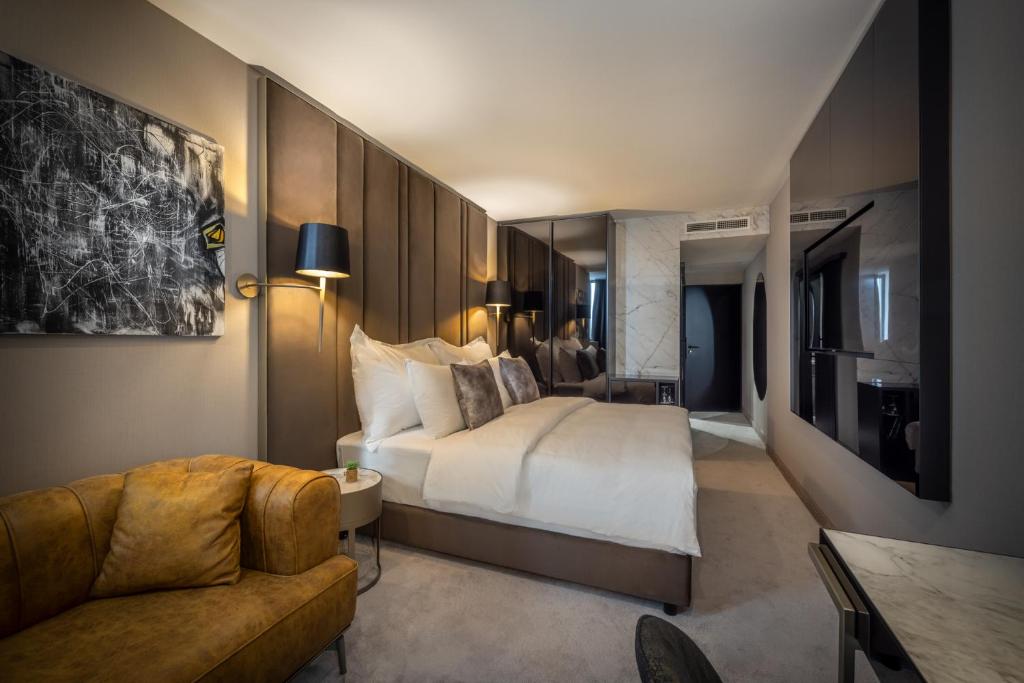 Postel nebo postele na pokoji v ubytování Grand Hotel Adriatic