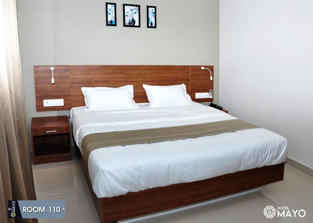 Postel nebo postele na pokoji v ubytování Hotel Mayo